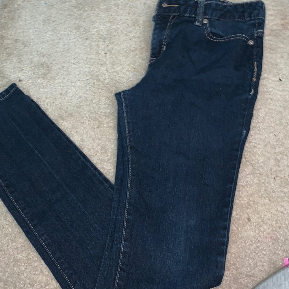 Skinny dark blue jeans